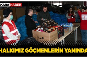 Sınırındaki göçmenlere yardım yağdı