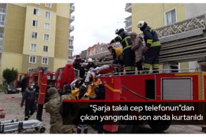 Şarja takılı cep telefonundan çıkan yangından son anda kurtarıldı
